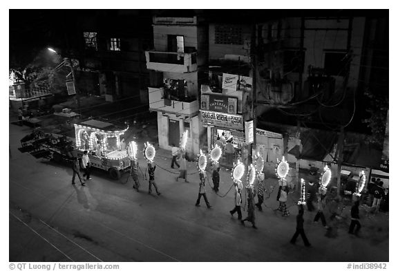 Street wedding procession bright lights seen from above. Varanasi, Uttar Pradesh, India (black and white)