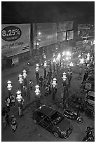 Street and wedding procession by night from above. Varanasi, Uttar Pradesh, India ( black and white)