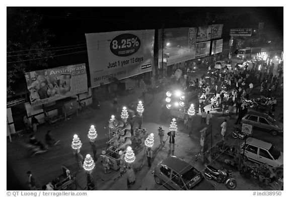 Wedding procession seen from above at night. Varanasi, Uttar Pradesh, India (black and white)