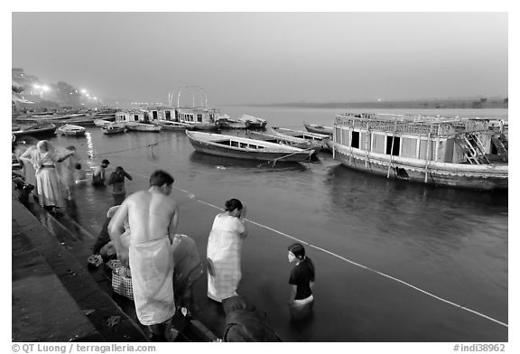 Ritual bath in the Ganga River at dawn. Varanasi, Uttar Pradesh, India (black and white)