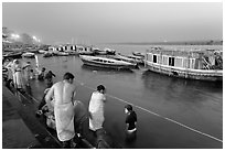 Ritual bath in the Ganga River at dawn. Varanasi, Uttar Pradesh, India (black and white)