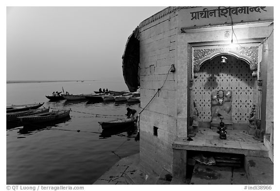 Shrine on the banks of the Ganges River at dawn. Varanasi, Uttar Pradesh, India (black and white)
