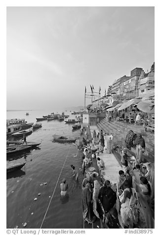 People worshipping Ganges River, early morning. Varanasi, Uttar Pradesh, India (black and white)