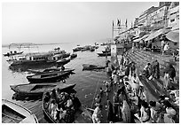 Activity on the steps of Dasaswamedh Ghat, early morning. Varanasi, Uttar Pradesh, India (black and white)