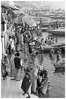 Gathering on the banks of Ganges River, sunrise. Varanasi, Uttar Pradesh, India (black and white)