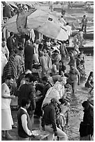 Colorful crowd at the edge of water, Dasaswamedh Ghat. Varanasi, Uttar Pradesh, India (black and white)