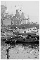 Man with arms stretched standing in Ganga River. Varanasi, Uttar Pradesh, India ( black and white)