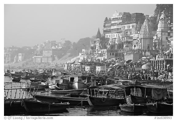 Boats and temples of Dasaswamedh Ghat, sunrise. Varanasi, Uttar Pradesh, India (black and white)