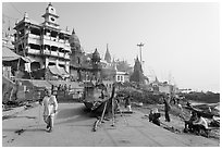 Manikarnika Ghat, with piles of wood used for cremation. Varanasi, Uttar Pradesh, India ( black and white)