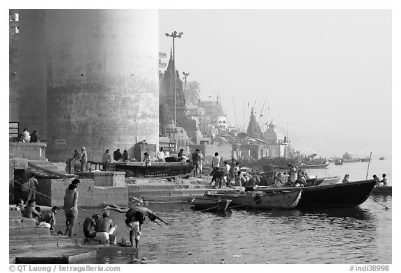 Ganges riverbank with men bathing. Varanasi, Uttar Pradesh, India