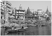 Rowboat and Manikarnika Ghat. Varanasi, Uttar Pradesh, India (black and white)