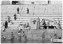 Men finishing their bath below the steps of Scindhia Ghat. Varanasi, Uttar Pradesh, India (black and white)