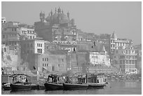 Alamgir Mosque above boats and the Ganges River. Varanasi, Uttar Pradesh, India (black and white)