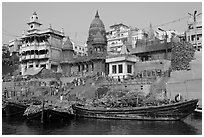 Huge piles of firewood stacked at Manikarnika Ghat. Varanasi, Uttar Pradesh, India ( black and white)