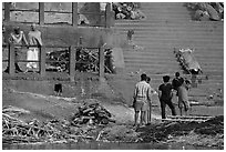 Cremation in progress, with another corpse awaiting, Manikarnika Ghat. Varanasi, Uttar Pradesh, India ( black and white)