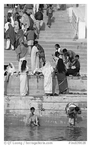 Women rinsing in river Ganges water. Varanasi, Uttar Pradesh, India