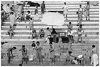 Men after bath on steps of Meer Ghat. Varanasi, Uttar Pradesh, India ( black and white)