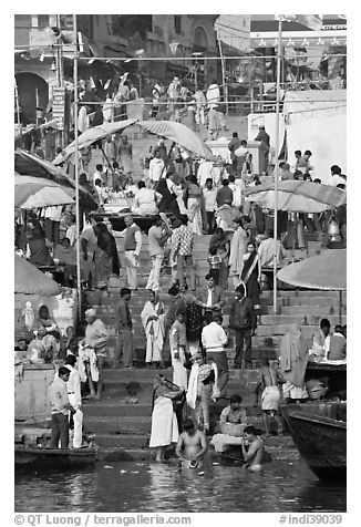 Colorful crowd on steps of Dasaswamedh Ghat. Varanasi, Uttar Pradesh, India (black and white)
