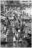 Colorful crowd on steps of Dasaswamedh Ghat. Varanasi, Uttar Pradesh, India (black and white)