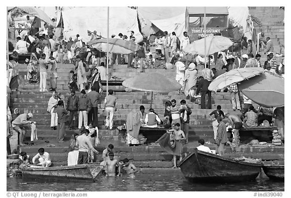 Ganga riverside activity on steps of Dasaswamedh Ghat. Varanasi, Uttar Pradesh, India (black and white)