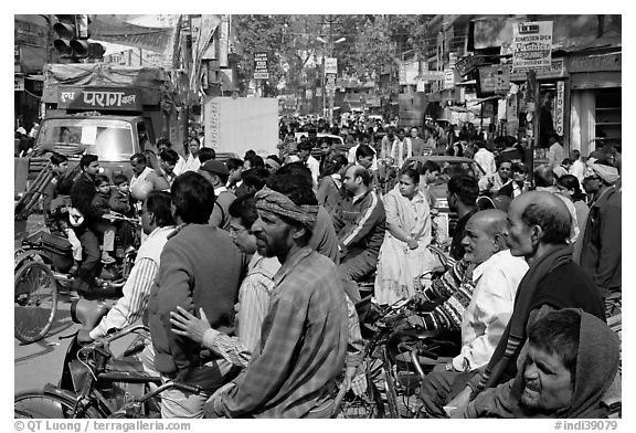 Riders waiting in congested street. Varanasi, Uttar Pradesh, India (black and white)