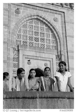 Girls in front of Gateway of India. Mumbai, Maharashtra, India (black and white)