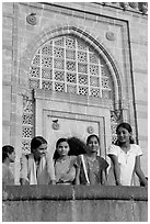 Girls in front of Gateway of India. Mumbai, Maharashtra, India (black and white)