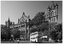 Yellow double-decker bus in front of Victoria Terminus. Mumbai, Maharashtra, India ( black and white)