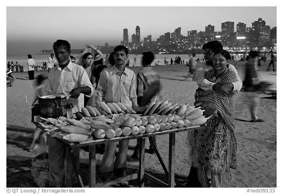 Corn stall at twilight, Chowpatty Beach. Mumbai, Maharashtra, India