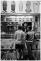 Stall with colorful drinks, Chowpatty Beach. Mumbai, Maharashtra, India (black and white)