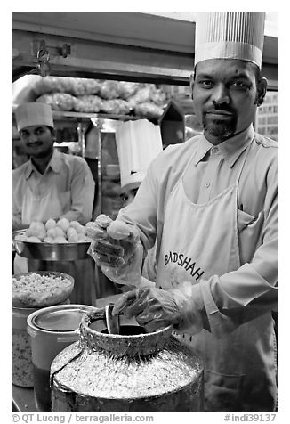 Cooks in food stall, Chowpatty Beach. Mumbai, Maharashtra, India