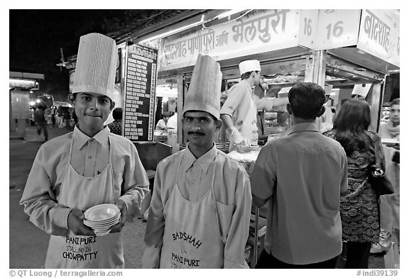 Cooks in front of Panipuri stall, Chowpatty Beach. Mumbai, Maharashtra, India