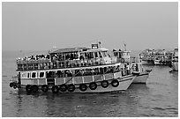 Tour boat at twilight. Mumbai, Maharashtra, India ( black and white)