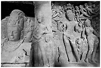 Mahesh Murti and Gangadhara Siva carved in rock, main  Elephanta cave. Mumbai, Maharashtra, India (black and white)