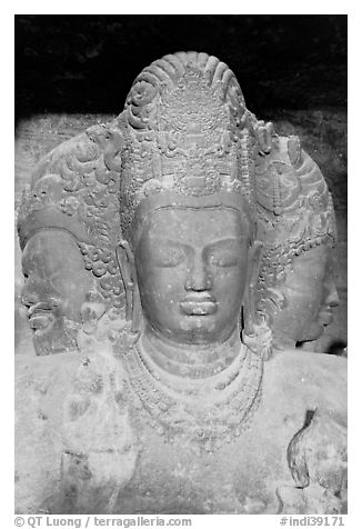 Triple-headed Shiva sculpture, Elephanta caves. Mumbai, Maharashtra, India