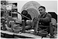 Men polishing marble. Agra, Uttar Pradesh, India (black and white)