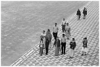 Families walking on decorated terrace, Taj Mahal. Agra, Uttar Pradesh, India ( black and white)