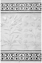 Bas reliefs and pietra dura inlays of flowers, Taj Mahal. Agra, Uttar Pradesh, India (black and white)