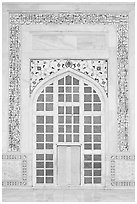 Door in pishtaq decorated with caliligraphy. Agra, Uttar Pradesh, India (black and white)