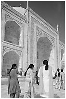 Women in colorful Shalwar suits, Taj Mahal. Agra, Uttar Pradesh, India (black and white)