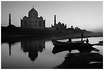 Boat on Yamuna River in front of Taj Mahal, sunset. Agra, Uttar Pradesh, India ( black and white)