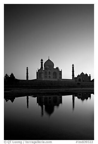 Taj Mahal reflected in  Yamuna River at sunset. Agra, Uttar Pradesh, India (black and white)