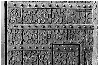 Detail of door with horseshoes, Dargah (Jama Masjid) mosque. Fatehpur Sikri, Uttar Pradesh, India ( black and white)