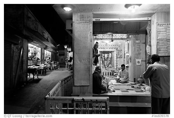 Hindu temple at street corner by night. Bharatpur, Rajasthan, India (black and white)