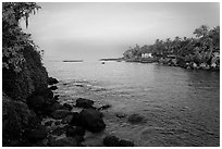 Oceanfront with house and palm trees, Dona Paula. Goa, India (black and white)