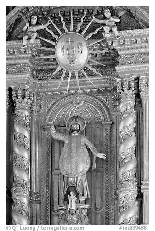 Richly guilded  main altar, Basilica of Bom Jesus, Old Goa. Goa, India (black and white)