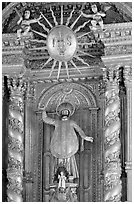 Richly guilded  main altar, Basilica of Bom Jesus, Old Goa. Goa, India (black and white)