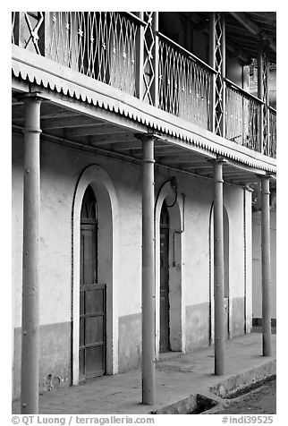 House with balconies painted green, Panjim. Goa, India