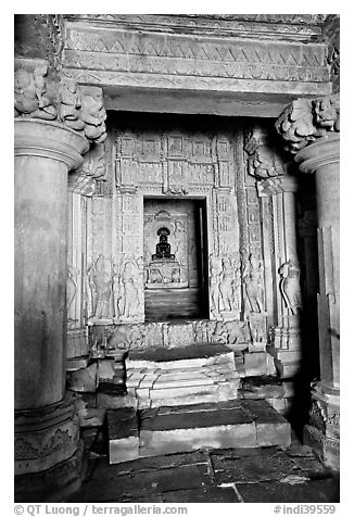 Columns and inner sanctum  with black image of Parsvanatha, Parsvanatha temple, Eastern Group. Khajuraho, Madhya Pradesh, India
