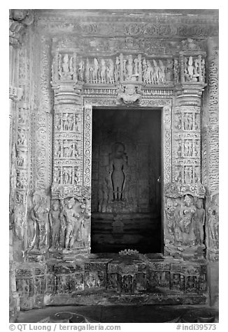 Inner sanctum with flowers and Vishnu image, Javari Temple, Eastern Group. Khajuraho, Madhya Pradesh, India (black and white)